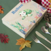 Børnebestik i en havprintet kasse Børnebestik i en havprintet kasse