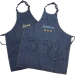Broderet forklæde i denim Broderet forklæde i denim